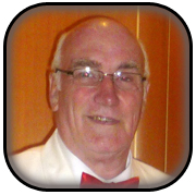 A white man in a red bow tie.