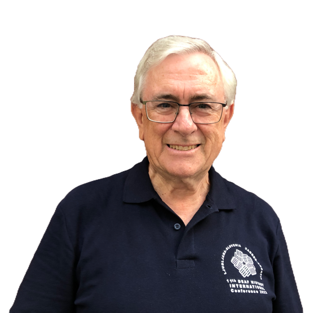 A white man with white hair in a DHI polo shirt.